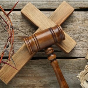 Image of a cross, thorns, and gavel