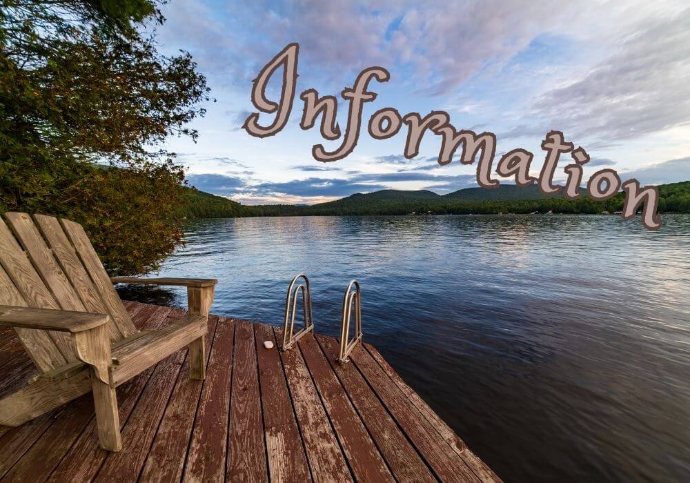 Deck on a beautiful lake with Adirondack chair and "Information" script.