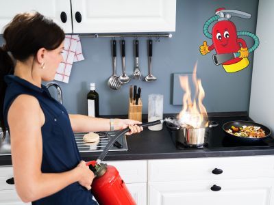 Woman putting out stovetop fire