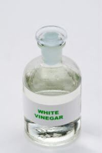 Clear bottle marked "White Vinegar"