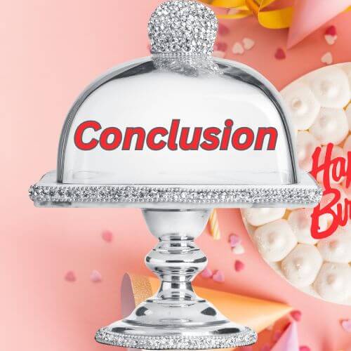Glass pedestal cake stand with "Conclusion" on it and background of birthday trimmings.