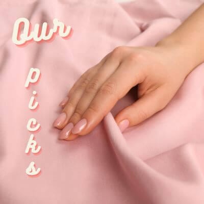 Hand on pink sheets with "Our Picks"