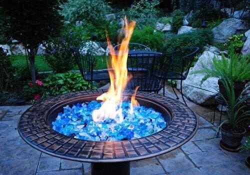 Blue fire glass on a tabletop fire pit