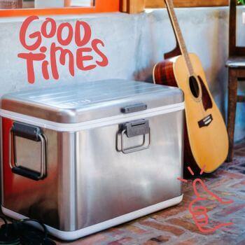 A stainless steel V Series Yeti hard cooler with guitar in background