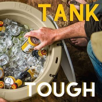 The Tank cooler filled with ice and canned drinks with Tank Tough written on it.